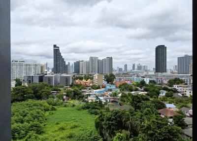 Scenic urban skyline view from a building balcony