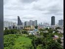 Scenic urban skyline view from a building balcony