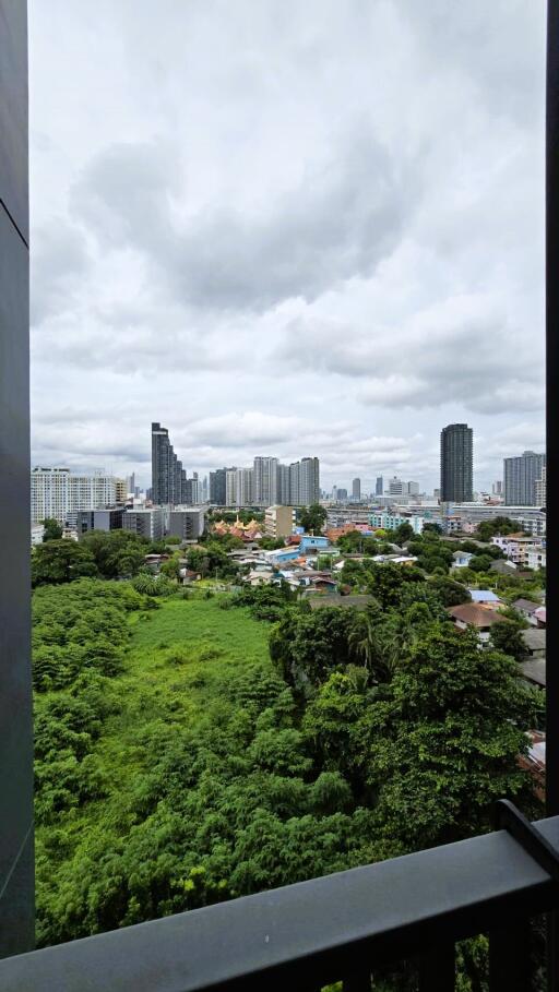 Scenic urban skyline view from a building balcony