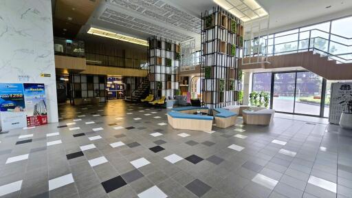 Modern lobby with seating and decorative elements