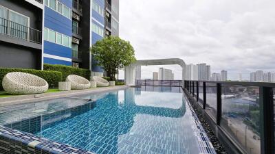 Swimming pool area with cityscape view