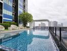 Swimming pool area with cityscape view