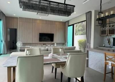 Modern living room with attached kitchen and dining area