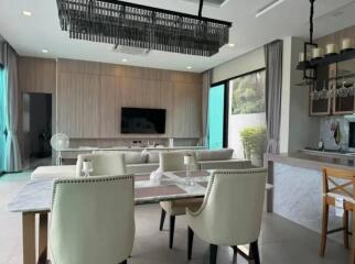 Modern living room with attached kitchen and dining area