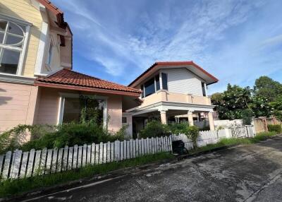 Beautiful suburban home with a red-tiled roof