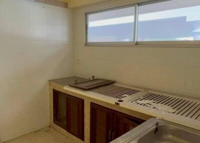 Kitchen space with countertop and sink