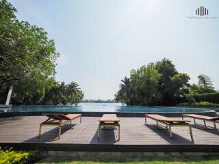 Outdoor pool with lounging area