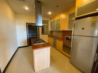 Modern kitchen with island and stainless steel appliances