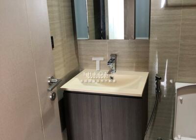 Modern bathroom with vanity and toilet