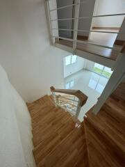 Indoor staircase leading to the lower floor