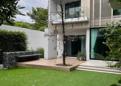 Modern two-story house with a backyard