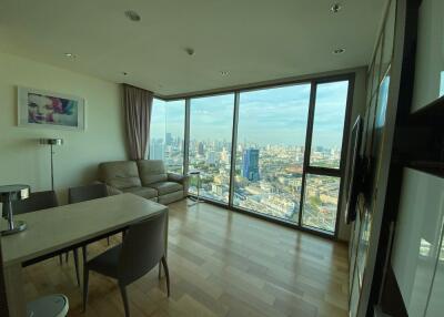 Modern living room with large windows and city view