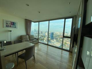 Modern living room with large windows and city view