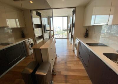 Modern kitchen with appliances and large window