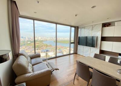 Modern living area with large windows and city view