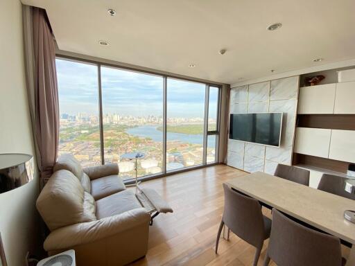 Modern living area with large windows and city view