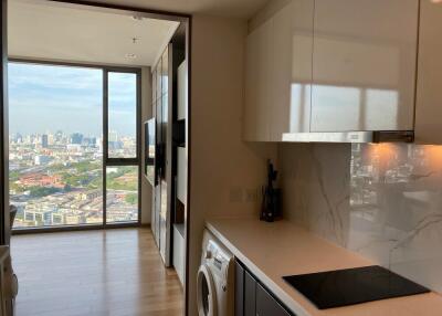 Compact kitchen space with city view