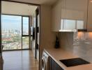 Compact kitchen space with city view