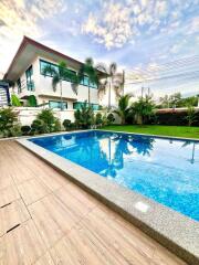 Modern house with swimming pool and garden