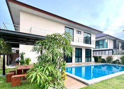 Modern house with swimming pool and garden