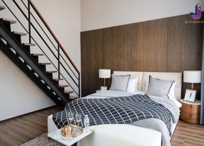 Modern bedroom with a staircase