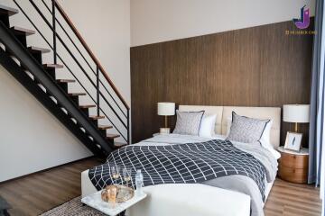 Modern bedroom with a staircase