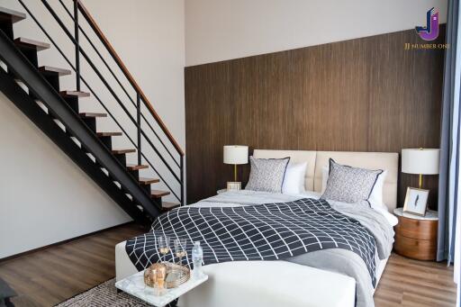 Modern bedroom with a staircase