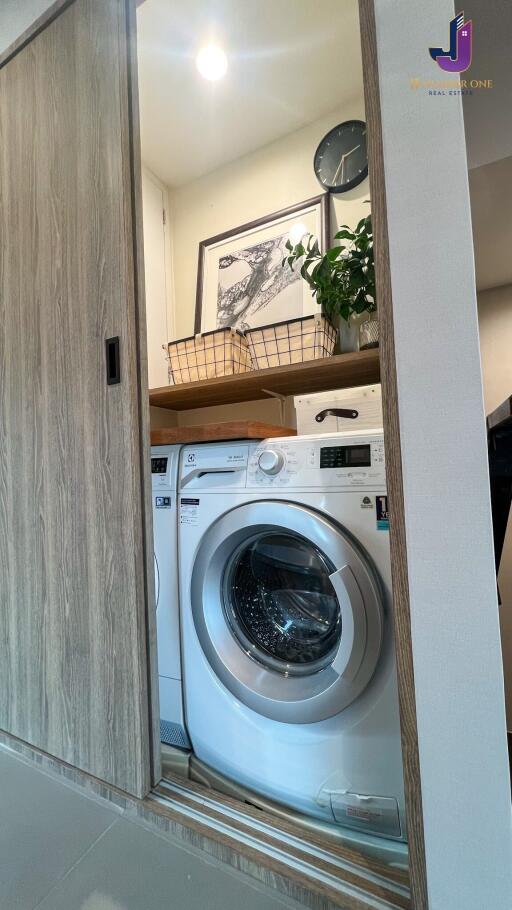 Modern laundry area with washer and dryer