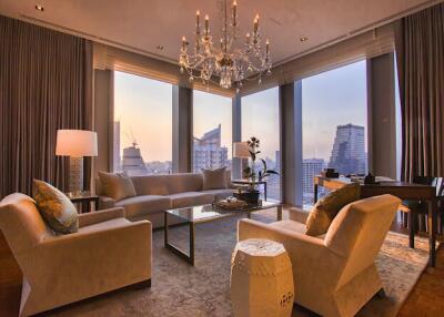 Elegant living room with large windows and city view