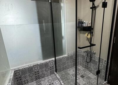 Modern bathroom with glass shower enclosure