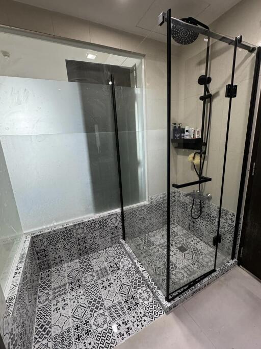 Modern bathroom with glass shower enclosure