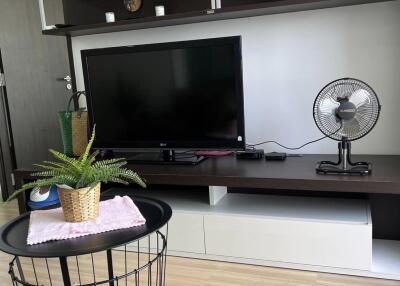 Modern living room with TV unit and decor