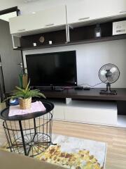 Modern living room with TV unit and decor