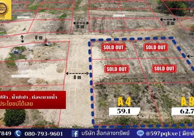 Aerial view of land plots for sale with labels and measurements