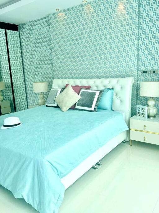 Modern bedroom with blue and white decor