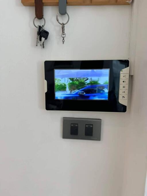 Wall-mounted video intercom system in hallway