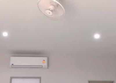 Ceiling with air conditioner and fan