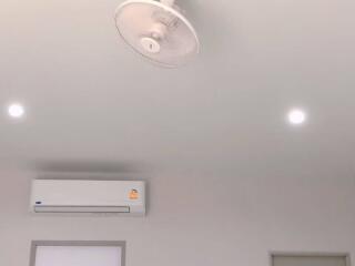 Ceiling with air conditioner and fan