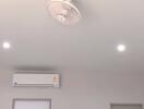 Ceiling with air conditioner and fan