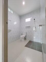 clean modern bathroom with shower and toilet