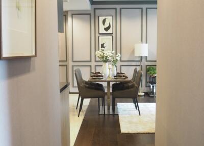 Elegant dining area with table set for four