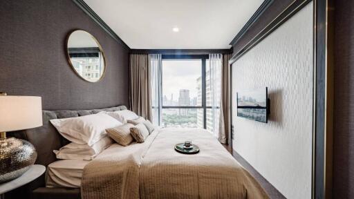 Modern bedroom with large window and city view