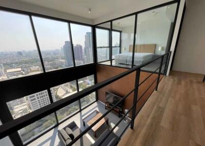 Loft-style apartment with large windows