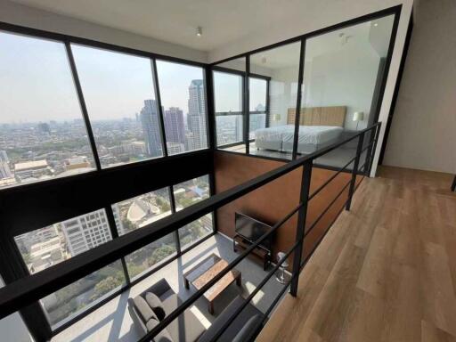 Loft-style apartment with large windows