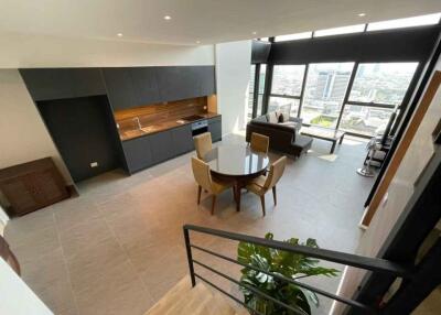 Open-plan kitchen and living area with city view