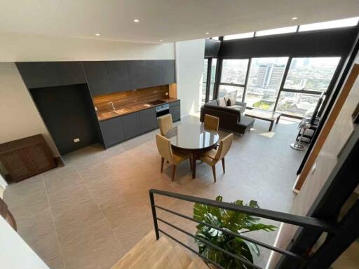 Open-plan kitchen and living area with city view