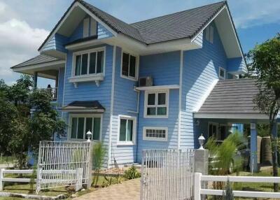 Exterior view of a modern blue house