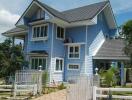 Exterior view of a modern blue house