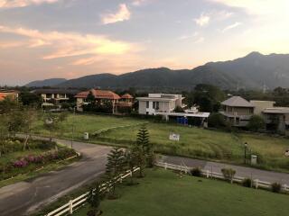 View of neighborhood with various houses and lush green surroundings