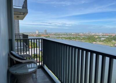 Balcony with a view of the city and river